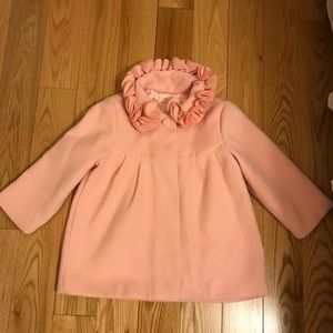 Pink jacket with rosette details